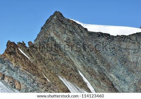 the north face and summit of the Feechopf between Zermatt and Saas Fee in the southern swiss alps