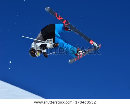 VERBIER, SWITZERLAND - FEBRUARY 24: Freestyle skier performing a back flip: February 24, 2014 in Verbier, Switzerland