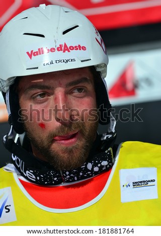 VEYSONNAZ, SWITZERLAND - MARCH 11: Fabio CORDI (ITA) world champion in the Snowboard Cross World Cup: March 11, 2014 in Veysonnaz, Switzerland