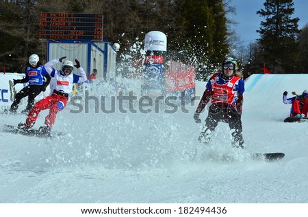VEYSONNAZ, SWITZERLAND - MARCH 11: world champion MALTAIS right wins the final in the Snowboard Cross World Cup final: March 11, 2014 in Veysonnaz, Switzerland
