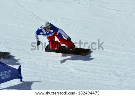 VEYSONNAZ, SWITZERLAND - MARCH 11: Nelly  MOENNE LOCCOZ (FRA) competing in the Snowboard Cross World Cup: March 11, 2014 in Veysonnaz, Switzerland