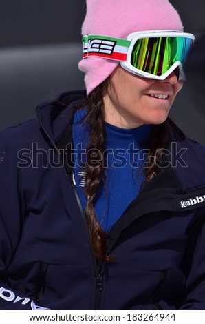 VEYSONNAZ, SWITZERLAND - MARCH 11: Finalist Raffaella BRUTTO (ITA) in the Snowboard Cross World Cup: March 11, 2014 in Veysonnaz, Switzerland