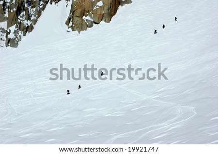 Two rope teams of 3 climbers each on the Mt Blanc