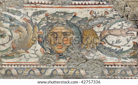 ancient roman mosaic of a mans face with moustache with sad searching expression from the remains of the Great Palace in constantinople