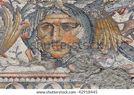 portrait of a man\'s face on an ancient byzantine mosaic in the remains of the Great Palace in Constantinople