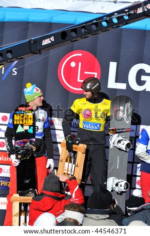 VEYSONNAZ, SWITZERLAND - JANUARY 15:  FIS World Championship Snowboard Cross finals. New world champion Pierre Vaultier, and 2nd David Speiser.  January 15 in Veysonnaz, Switzerland