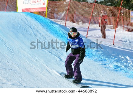 VEYSONNAZ, SWITZERLAND - JANUARY 15:  FIS World Championship Snowboard Cross finals. 3rd place world champion Maelle ricker on January 15, 2010 in Veysonnaz, Switzerland
