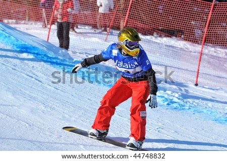 VEYSONNAZ, SWITZERLAND - JANUARY 15:  FIS World Championship Snowboard Cross finals. Runner up the beautiful Mellie Francon of Switzerland.  January 15 in Veysonnaz, Switzerland