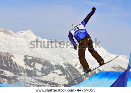 VEYSONNAZ, SWITZERLAND - JANUARY 15: World championship Snowboard cross  finals. Finalist, Stefano Pozzolini of Itali. January 15 in Veysonnaz, Switzerland.