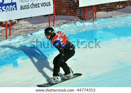 VEYSONNAZ, SWITZERLAND - JANUARY 15: World championship Snowboard cross  finals. Finalist Francois Boivin (4th place). January 15 in Veysonnaz, Switzerland.