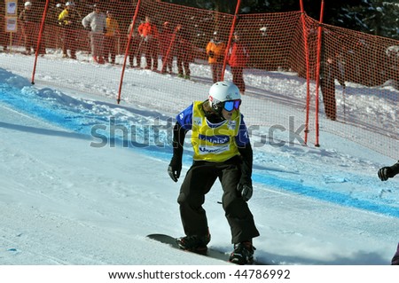 VEYSONNAZ, SWITZERLAND - JANUARY 15: World championship Snowboard cross  finals. Ladies finalist Nelly Loccoz Moenne. Janary 15, 2010 in Veysonnaz, Switzerland.
