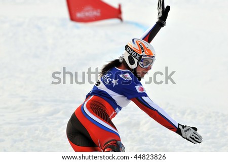 NENDAZ, SWITZERLAND - JANUARY 17: FIS World Championship Snowboard Giant Parallel Finals. Ladies world champion Tudegesheva. January 17, in Nendaz, Switzerland