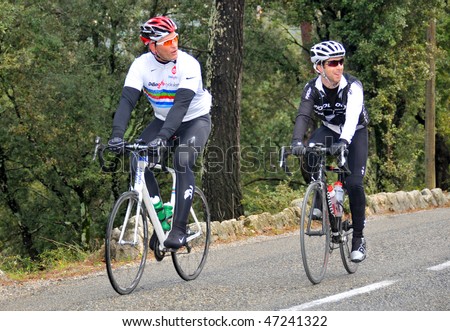 FREJUS, FRANCE- FEBRUARY 18: Lawrence Dallaglio (L)  cycles through the south of  France during the Dallaglio Cycle Slam February 18, 2010 in Frejus, France.