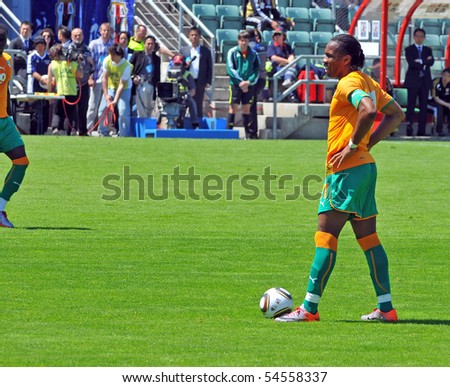 SION, SWITZERLAND - JUNE 4: Drogba takes a free kick and scores Ivory Coast in a friendly match against Japan for the 2010 world cup:  June 4, 2010 in Sion Switzerland