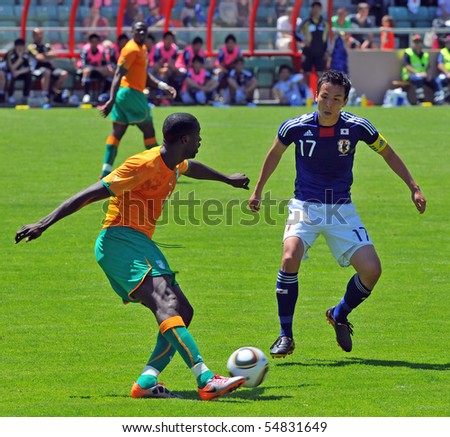 SION, SWITZERLAND - JUNE 4: Hasebe marking during Ivory Coast friendly match against Japan for the 2010 world cup:  June 4, 2010 in Sion Switzerland