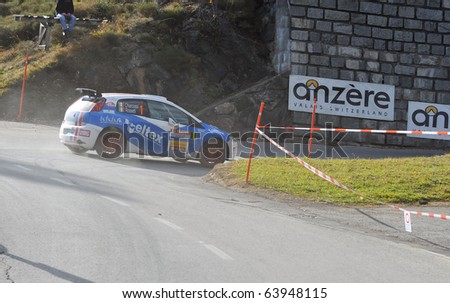 SION, SWITZERLAND - OCTOBER 28: the leader on Day 1, Stage 1 of the International Rally of the Valais Rossetti luca in a grande punto: October 28, 2010 in Sion Switzerland