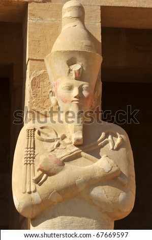 Statue of Queen Hatshepsut appearing as a male in her new kingdom mortuary temple of  at Thebes in Egypt