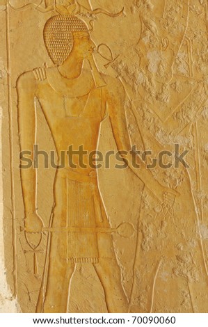http://image.shutterstock.com/display_pic_with_logo/255850/255850,1296413358,3/stock-photo-pharaoh-tuthmoses-iii-wearing-the-ram-s-horn-crown-holds-ankh-s-in-his-hands-while-receiving-the-70090060.jpg