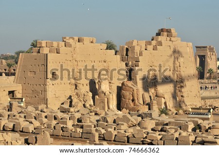 Hatshepsut\'s eighth pylon and colossal statues of the pharaohs at the ancient Egyptian temple of Amun at Karnak, Luxor in Egypt