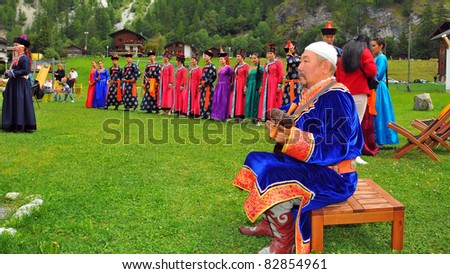 EVOLENE, SWITZERLAND - AUGUST 15: Buryat dance group at the International Festival of Folklore and Dance from the mountains (CIME) : August 15, 2011 in Evolene Switzerland