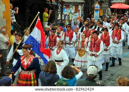EVOLENE, SWITZERLAND - AUGUST 15: Croatian dance group at the International Festival of Folklore and Dance from the mountains (CIME) : August 15, 2011 in Evolene Switzerland