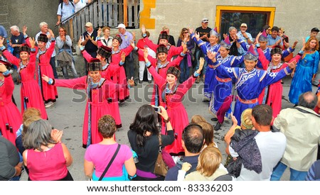 EVOLENE, SWITZERLAND - AUGUST 15: Buryat dance group at the International Festival of Folklore and Dance from the mountains (CIME) : August 15, 2011 in Evolene Switzerland