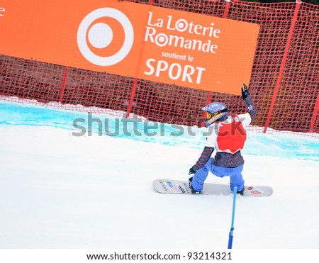VEYSONNAZ, SWITZERLAND - JANUARY 19: World Champion Lindsay Jacobellis (USA) in the FIS World Championship Snowboard Cross finals : January 19, 2012 in Veysonnaz Switzerland