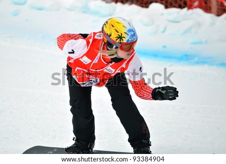 VEYSONNAZ, SWITZERLAND - JANUARY 22: Silver medalist Dominique Maltais (CAN) at the FIS World Championship Snowboard Cross finals : January 22, 2012 in Veysonnaz Switzerland