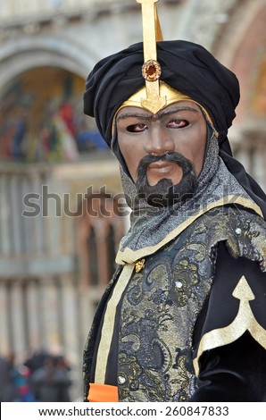 VENICE, ITALY - FEBRUARY 12: Moorish masked costumed man atthe 2015 Venice Carnival:  February  12, 2015 in Venice, Italy