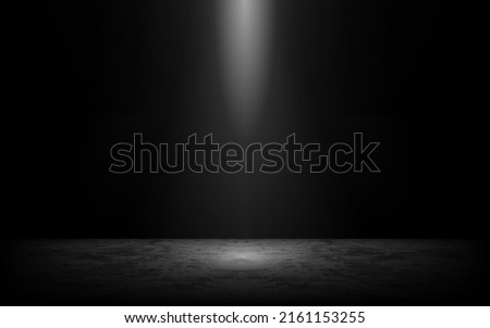 Product showcase with spotlight. Black studio room background. Use as montage for product display.