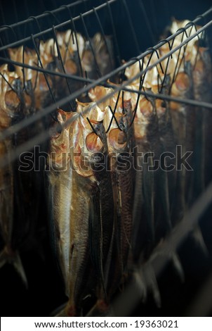 Smoked Flying-fish Every year about May and June, South of Eastern Taiwan, the native Taiwanese catch Flying-fishes and Bake fish
