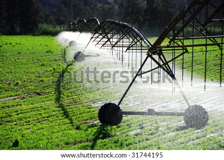 Modern irrigation system watering a farm