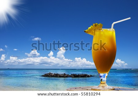 a Fresh fruit cocktail on a tropical island beach