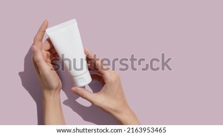 Similar – Image, Stock Photo Closeup of female hand holding brush drawing on a beach