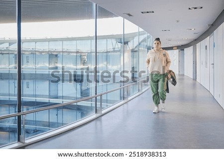 Similar – Image, Stock Photo View through a circular recess of a soccer goal to the opposite goal.