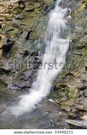 Small waterfall. Mountain river near Black Sea.