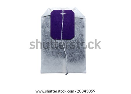 Tea bag with violet tag isolated on white background.