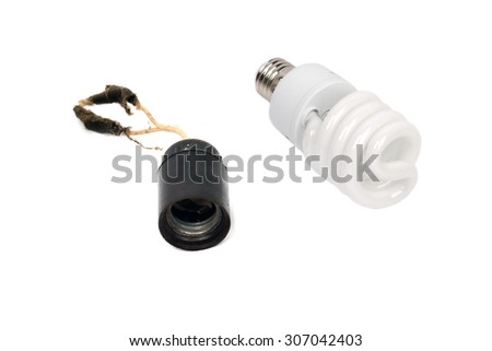 Old rusty lamp socket with wires and dust vs modern energy saving lamp isolated on white background.