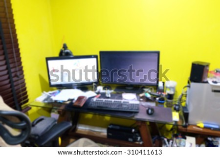 Abstract Messy workplace with mirror desk, blur background