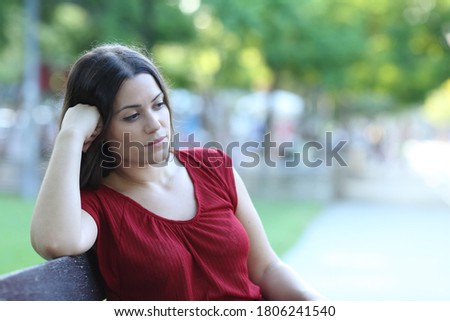 Similar – Image, Stock Photo Pensive woman sitting on bed