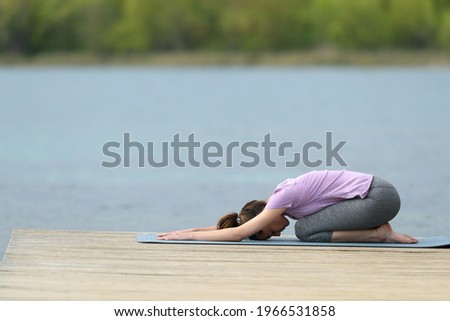 Similar – Image, Stock Photo Yoga girls doing Anahatasana pose. Cenital Plane