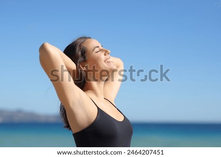 Similar – Image, Stock Photo sunbathe Wellness