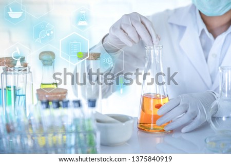 Beauty background, scientist is sampling a chemical extract from organic natural, research and develop background, Scientific concept is sample project about herbal medicine for health & beauty care. Сток-фото © 