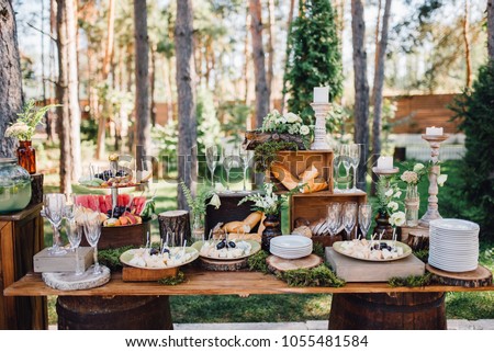 Similar – Image, Stock Photo Wedding candy bar table. Cakes with cream and berries and other sweets. High quality photo