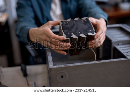 Similar – Image, Stock Photo Crop man fixing microchip in workshop