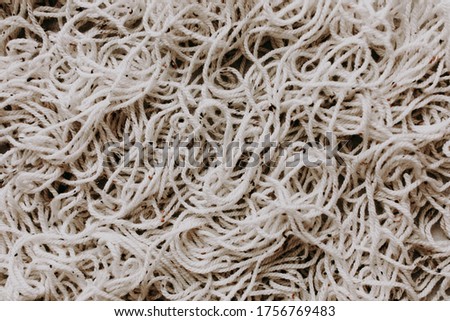 Similar – Image, Stock Photo Tangled macrame cord heap on grey background