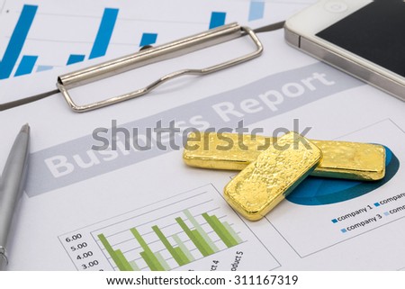 Gold Bullion on business report, Financial accounting, Selective focus.