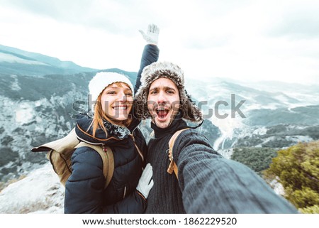 Similar – Image, Stock Photo Snow adventure young woman with backpack