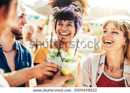 Similar – Image, Stock Photo Cheerful tourist drinking on steps