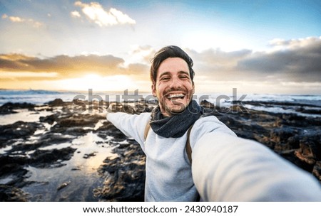 Similar – Image, Stock Photo Man takes a sunset photo on the phone